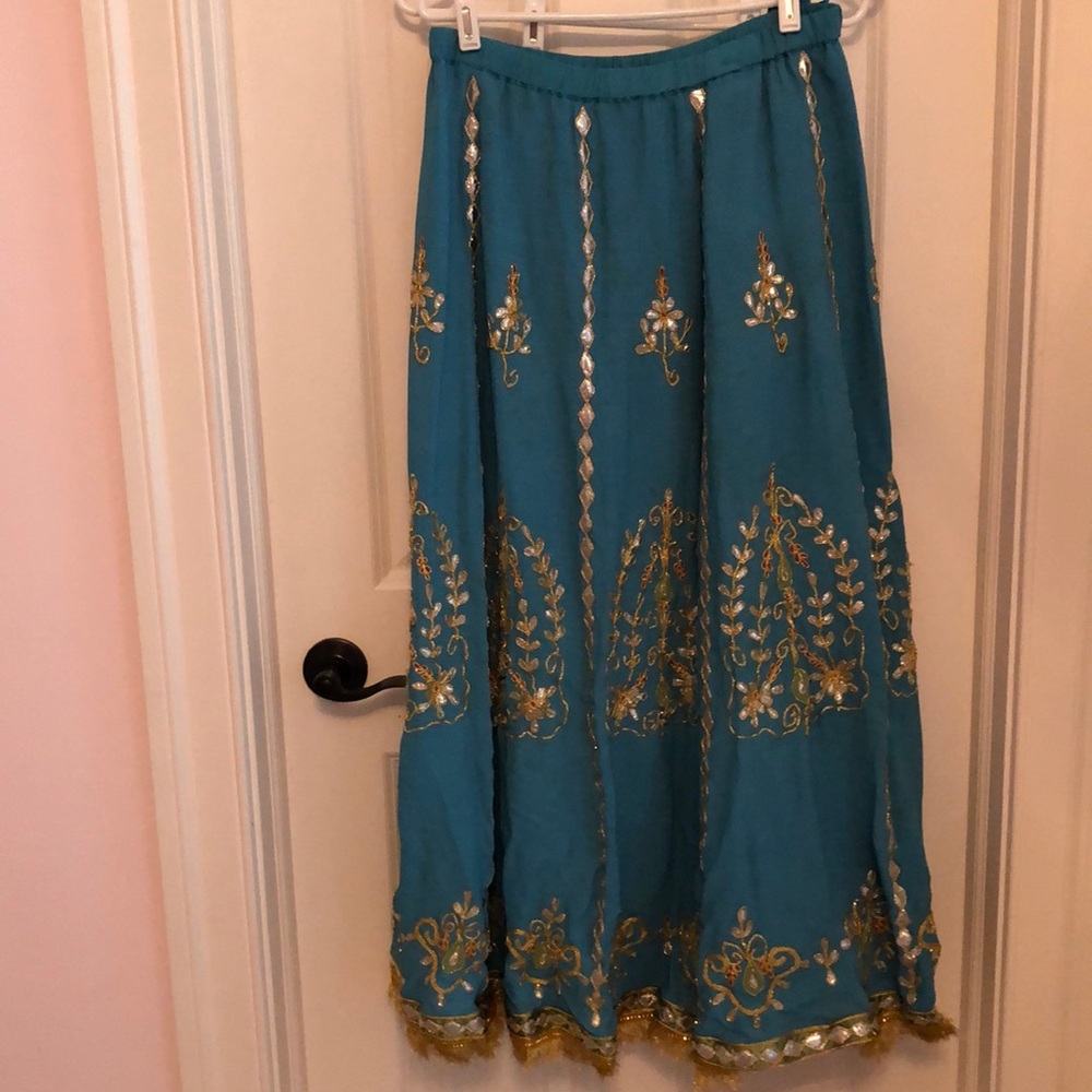 Blue Skirt with red and gold embroidery